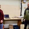 Engineering Technician Devin Ayotte and Resource Management and Protection Technician Michael Lester stand in front of marmot weigh scale